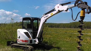 Аренда экскаватора погрузчика с ямобуром в Котлас цена от 1554 руб